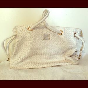 Large white Bebe Sport shoulder bag.